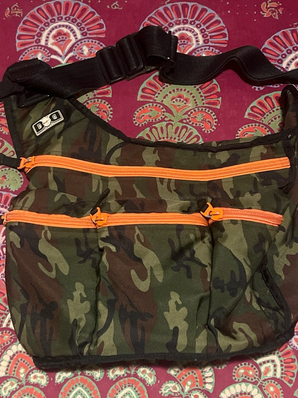 Camouflage Messenger Bag with Orange Zippers
